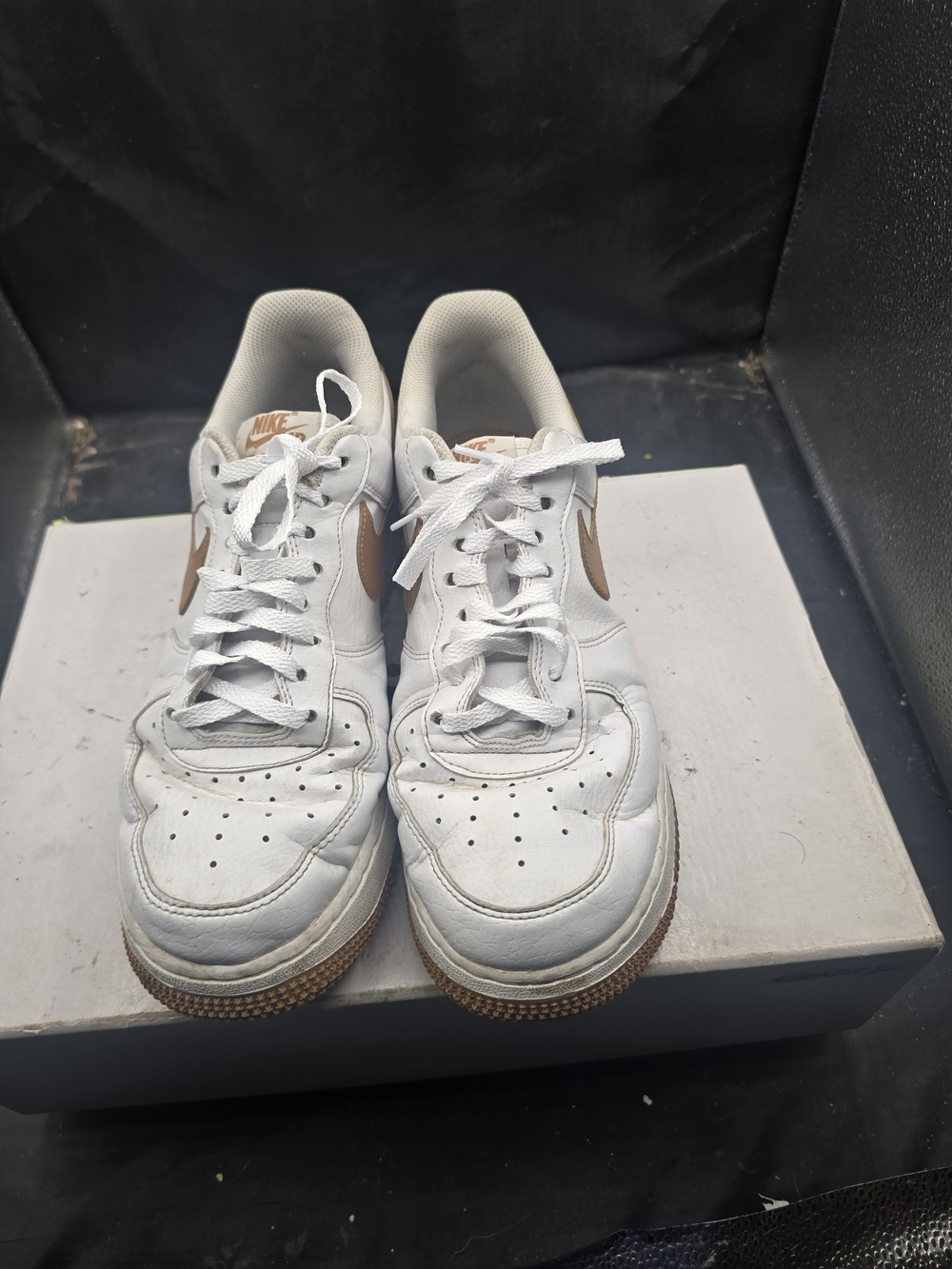 Nike White Sneakers with Brown Swoosh Accent